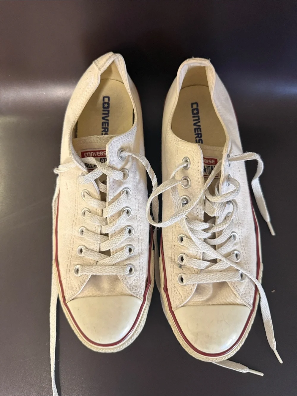 Converse Low Top Sneakers in White with Red Trim